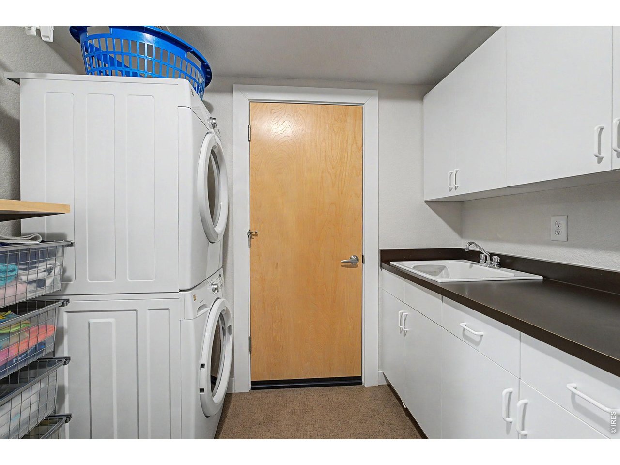 5055 Ralston Street, Unit A Boulder, CO 80304 - Photo 37 of 50 a kitchen with a refrigerator and a stove