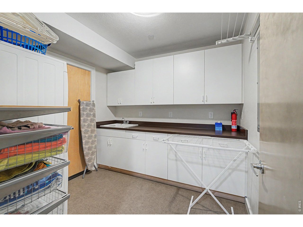 5055 Ralston Street, Unit A Boulder, CO 80304 - Photo 39 of 50 a kitchen with stainless steel appliances granite countertop a sink and a stove