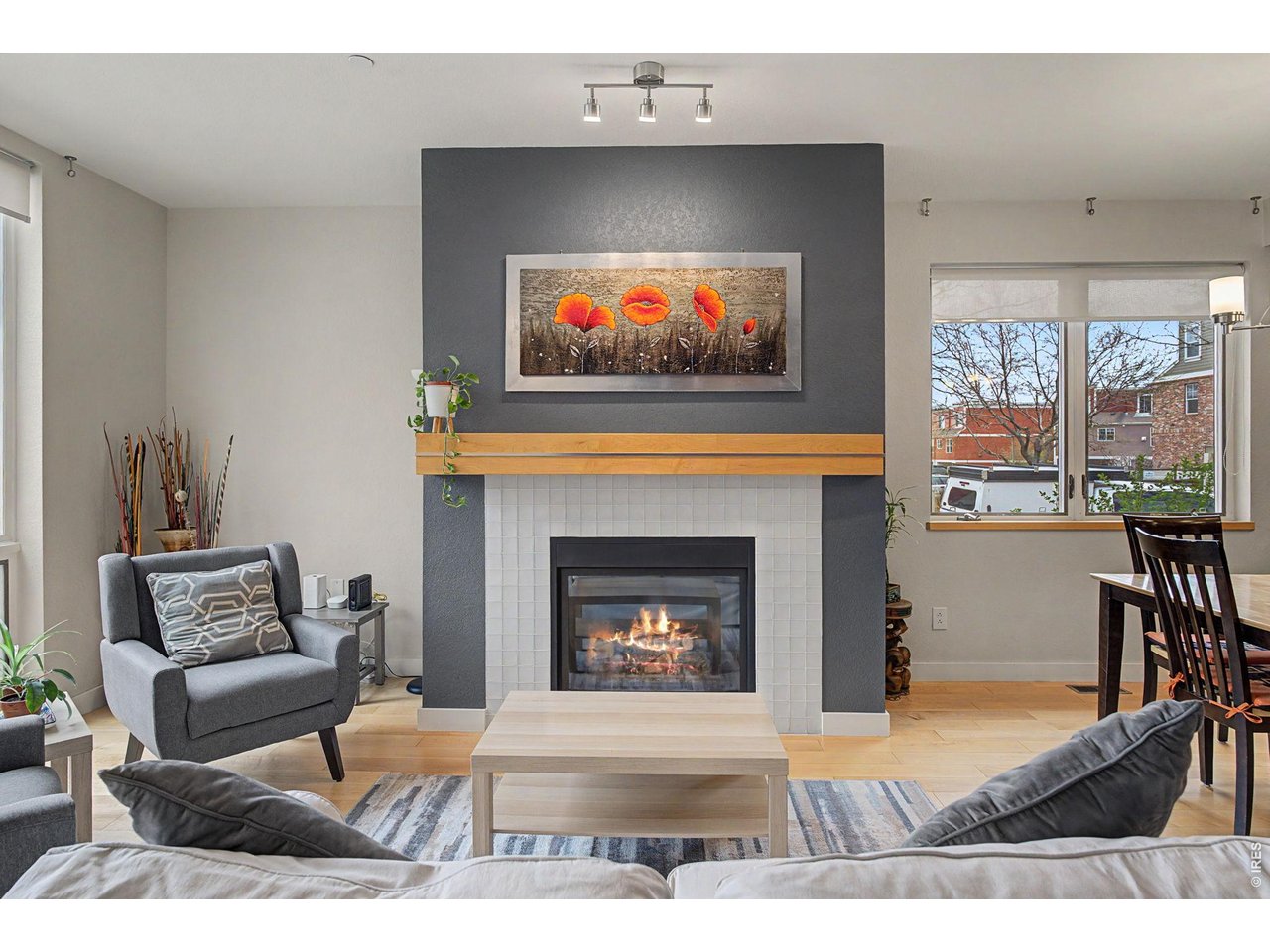5055 Ralston Street, Unit A Boulder, CO 80304 - Photo 5 of 50 a living room with furniture and a fireplace