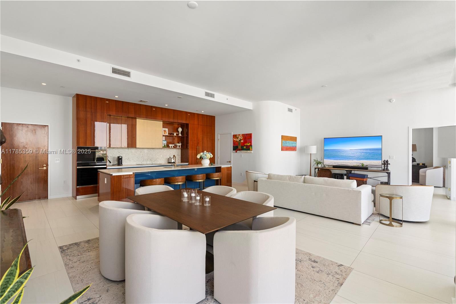 2678 Tigertail Avenue, Unit PH4 Miami, FL 33133 - Photo 14 of 75 a kitchen with stainless steel appliances kitchen island granite countertop a sink and a refrigerator