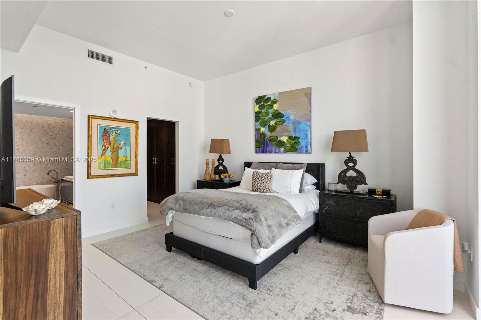 2678 Tigertail Avenue, Unit PH4 Miami, FL 33133 - Photo 15 of 75 a bedroom with a bed and painting on the wall