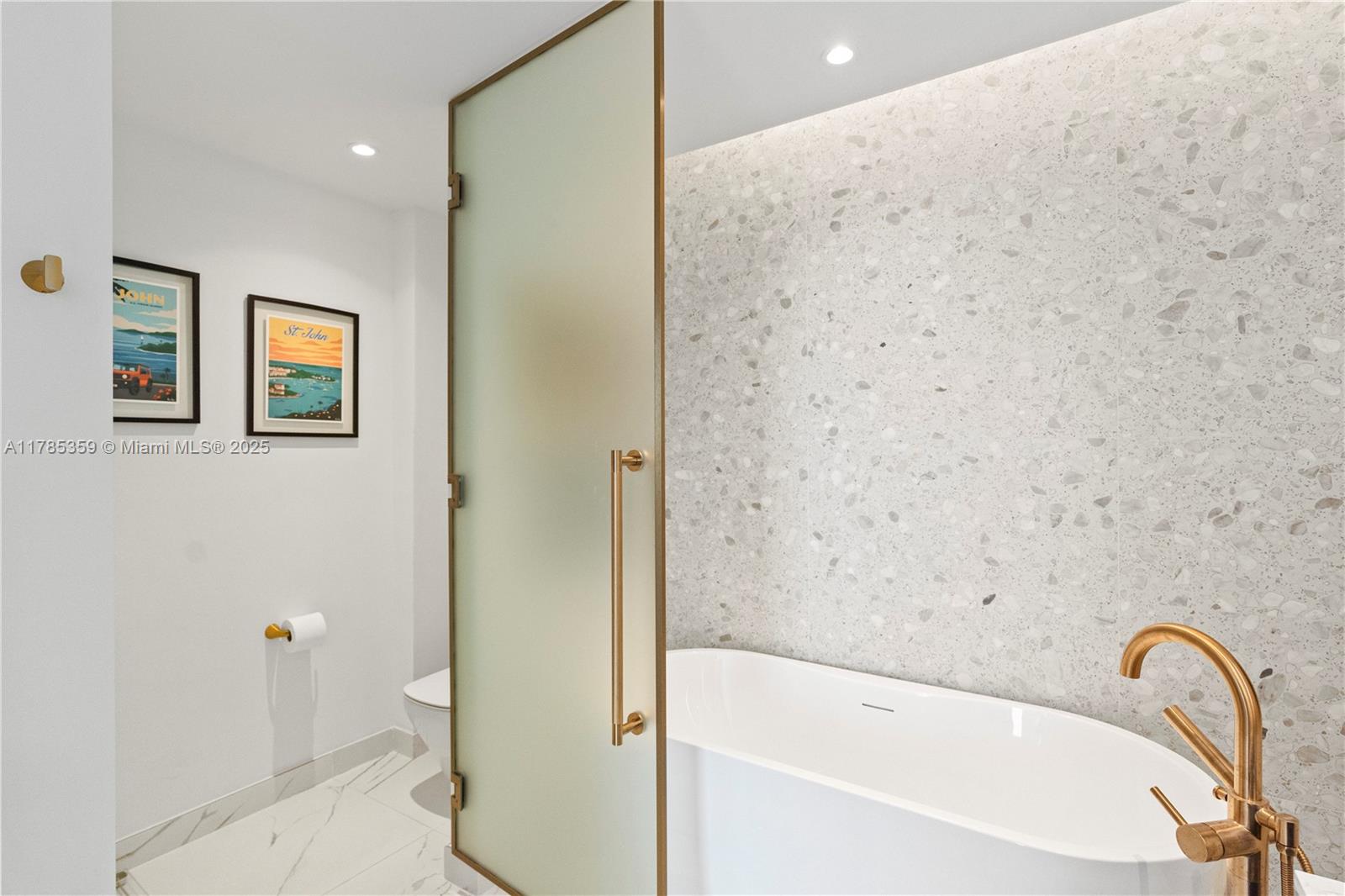 2678 Tigertail Avenue, Unit PH4 Miami, FL 33133 - Photo 30 of 75 a bathroom with a bathtub and shower