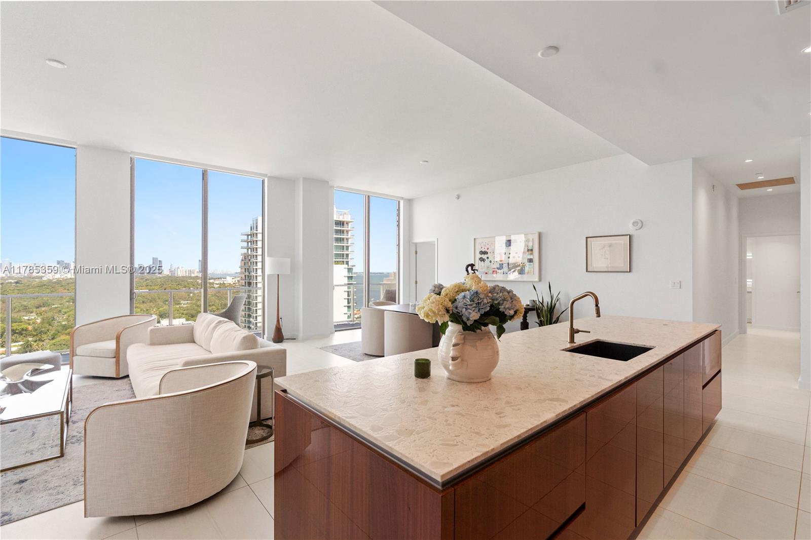 2678 Tigertail Avenue, Unit PH4 Miami, FL 33133 - Photo 3 of 75 a living room with furniture and window