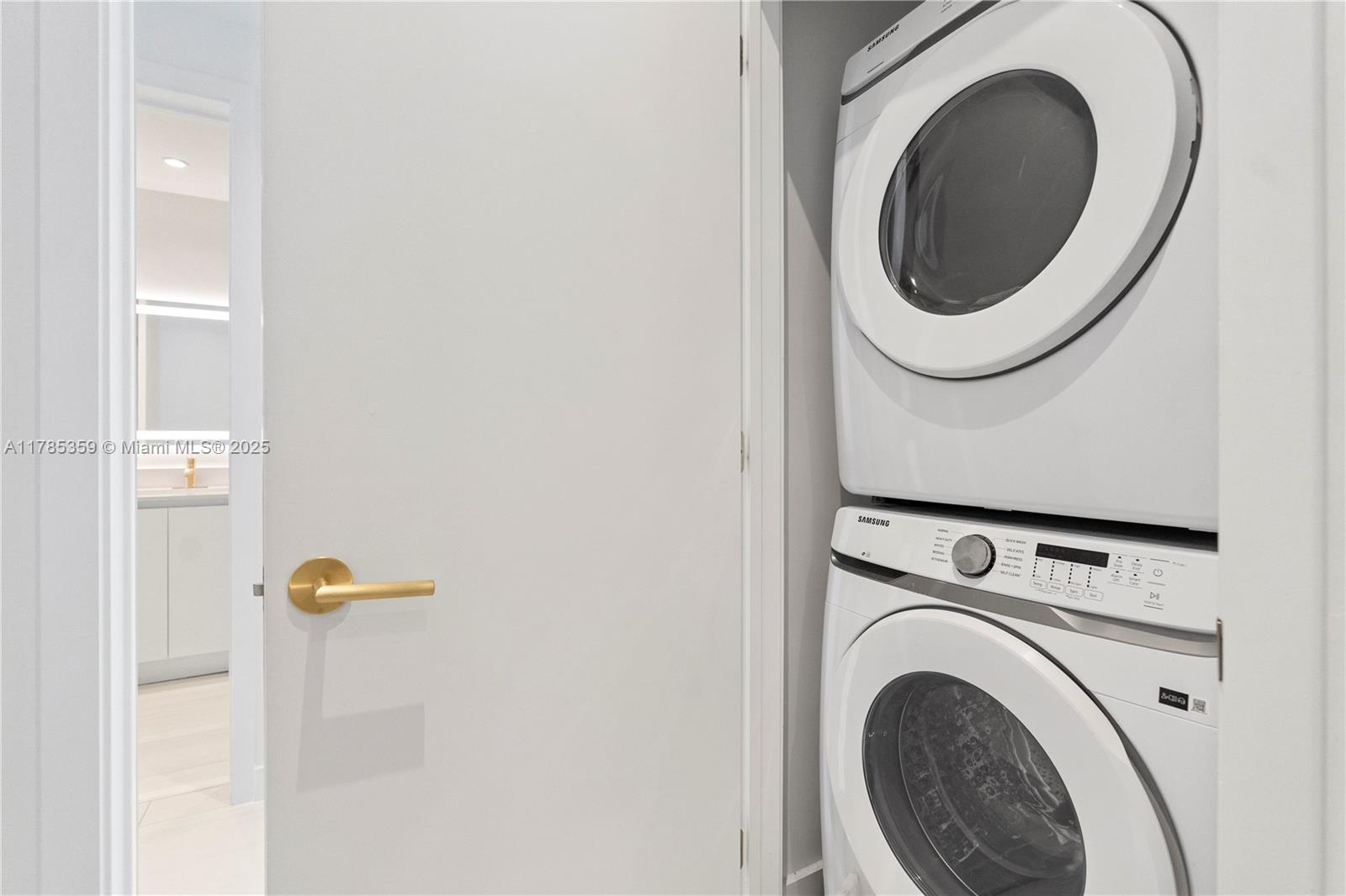 2678 Tigertail Avenue, Unit PH4 Miami, FL 33133 - Photo 32 of 75 a close view of a utility room with dryer and washer