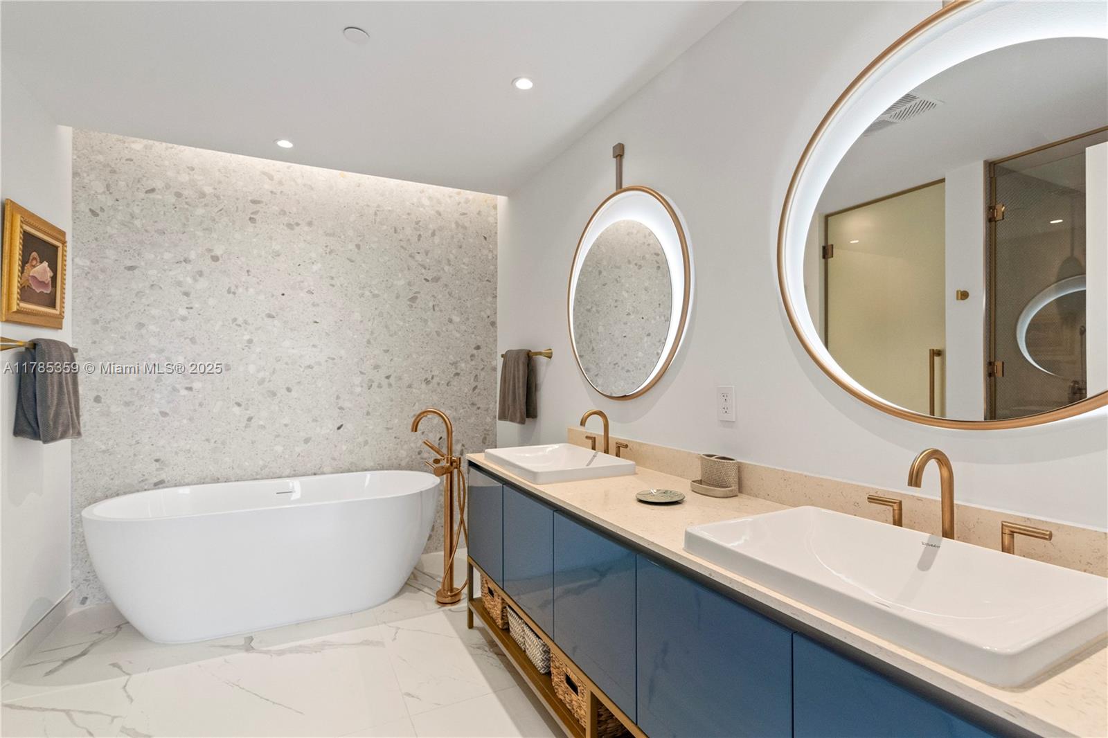 2678 Tigertail Avenue, Unit PH4 Miami, FL 33133 - Photo 37 of 75 a bathroom with a double vanity sink mirror and bathtub