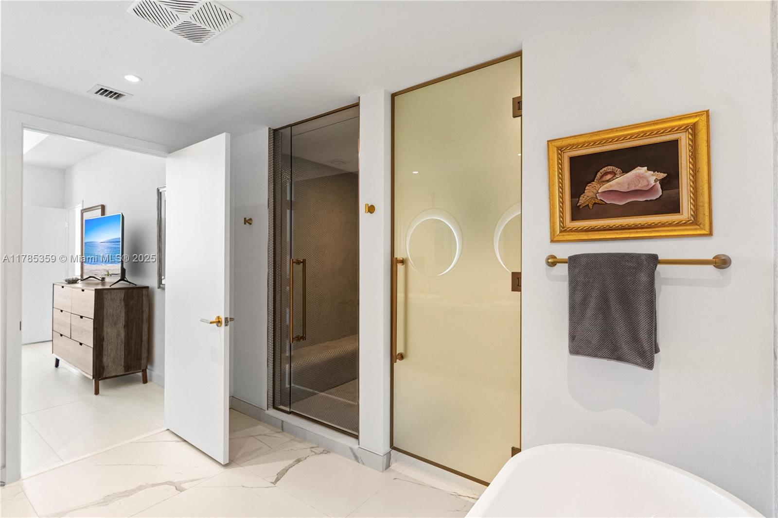 2678 Tigertail Avenue, Unit PH4 Miami, FL 33133 - Photo 39 of 75 a bathroom with a toilet sink and shower