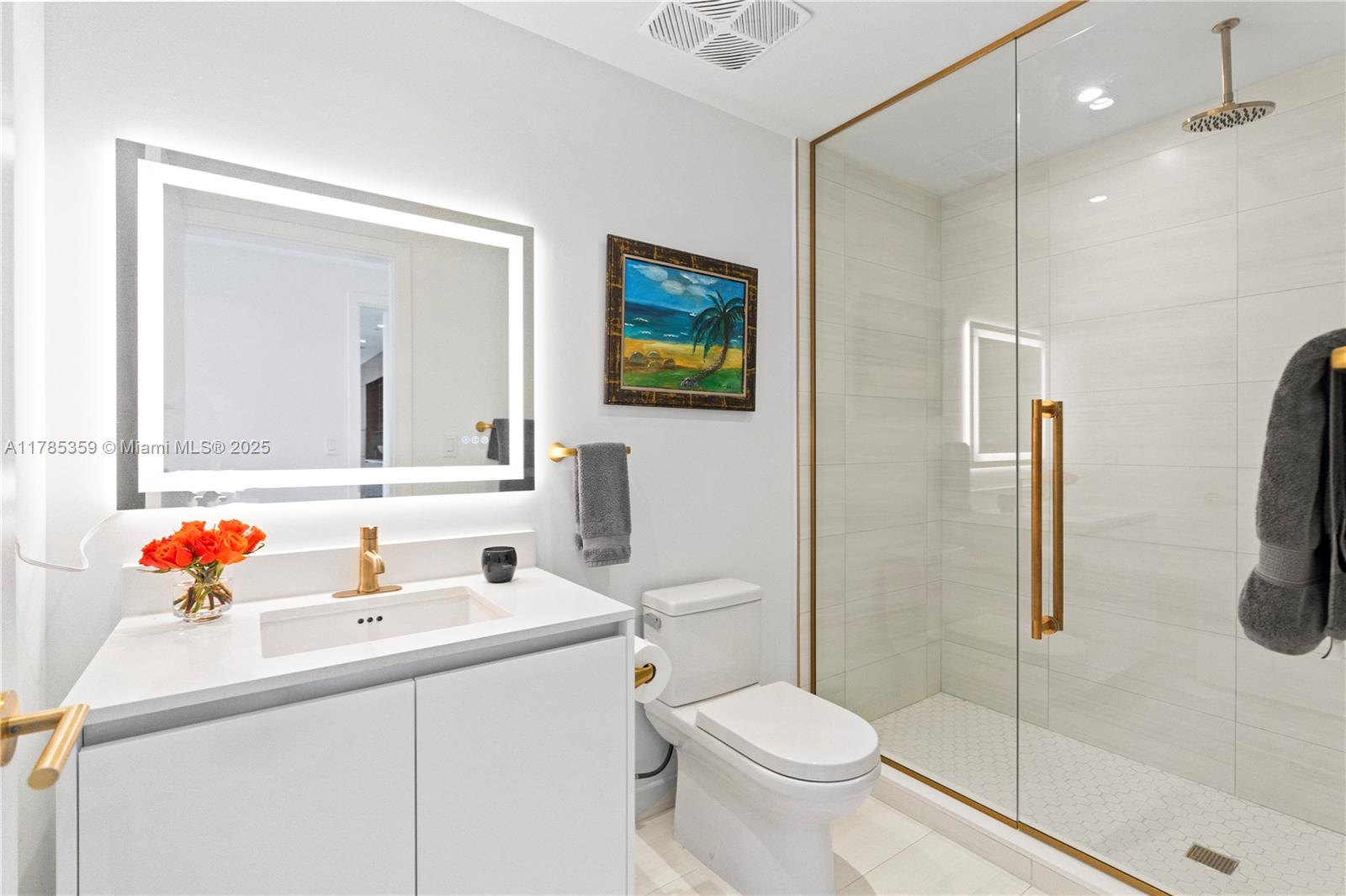 2678 Tigertail Avenue, Unit PH4 Miami, FL 33133 - Photo 40 of 75 a bathroom with a sink toilet and shower