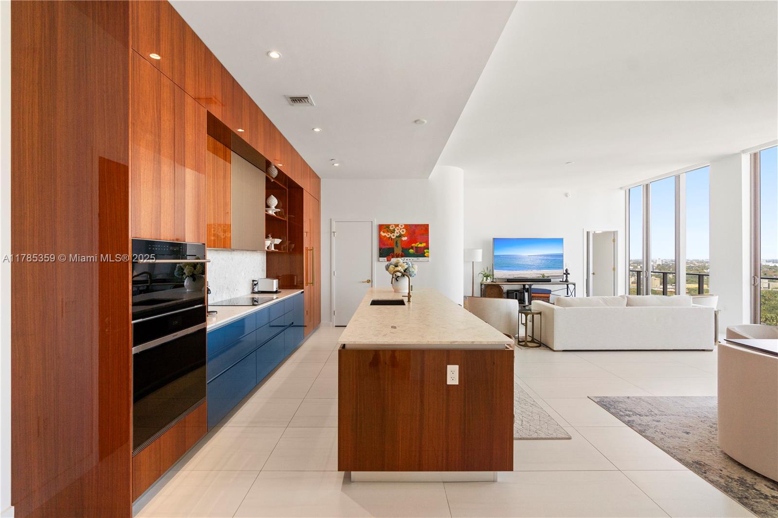 2678 Tigertail Avenue, Unit PH4 Miami, FL 33133 - Photo 4 of 75 a kitchen with stainless steel appliances granite countertop a stove a sink and a refrigerator