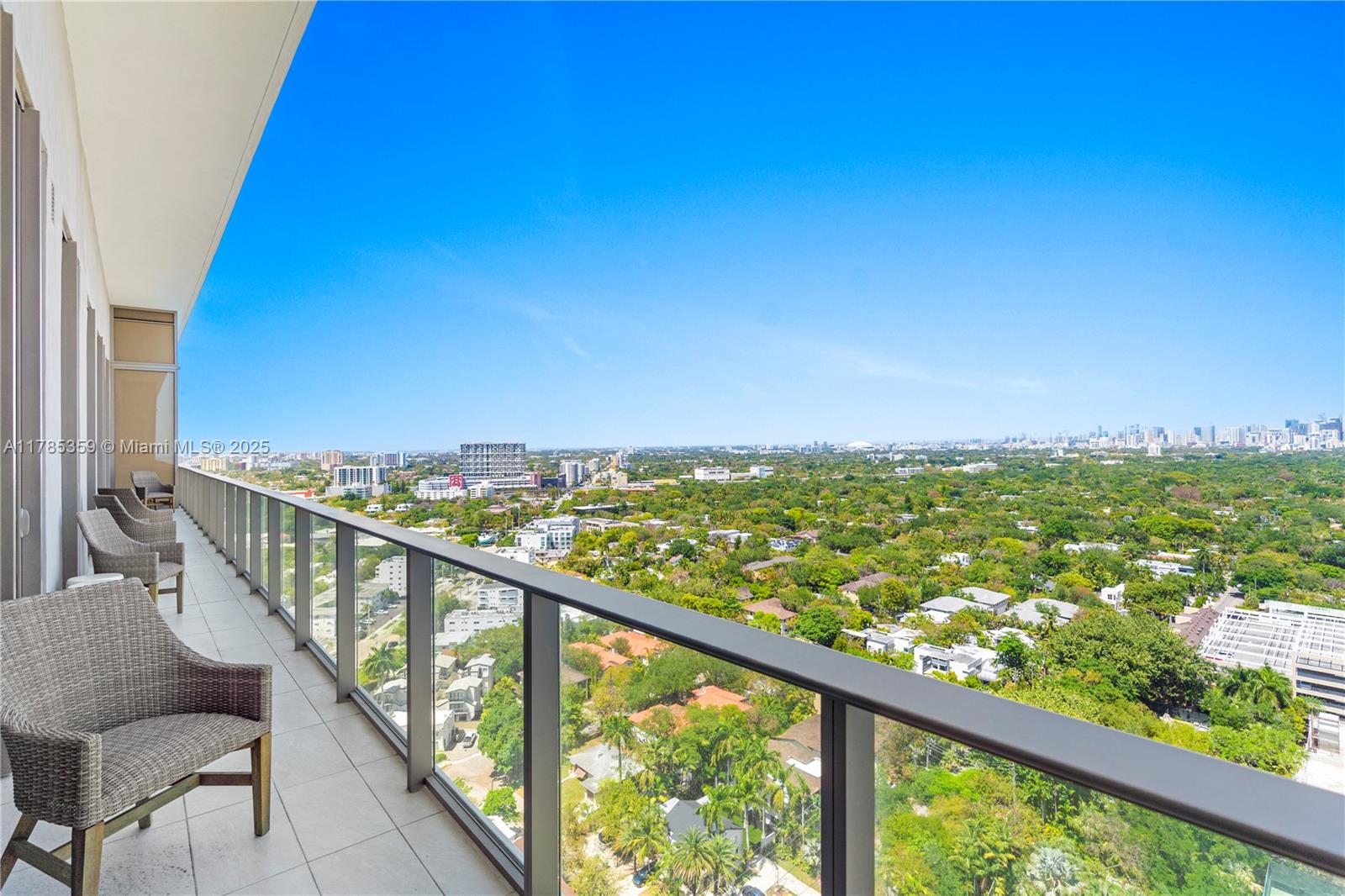 2678 Tigertail Avenue, Unit PH4 Miami, FL 33133 - Photo 46 of 75 a view of a city skyline from a balcony