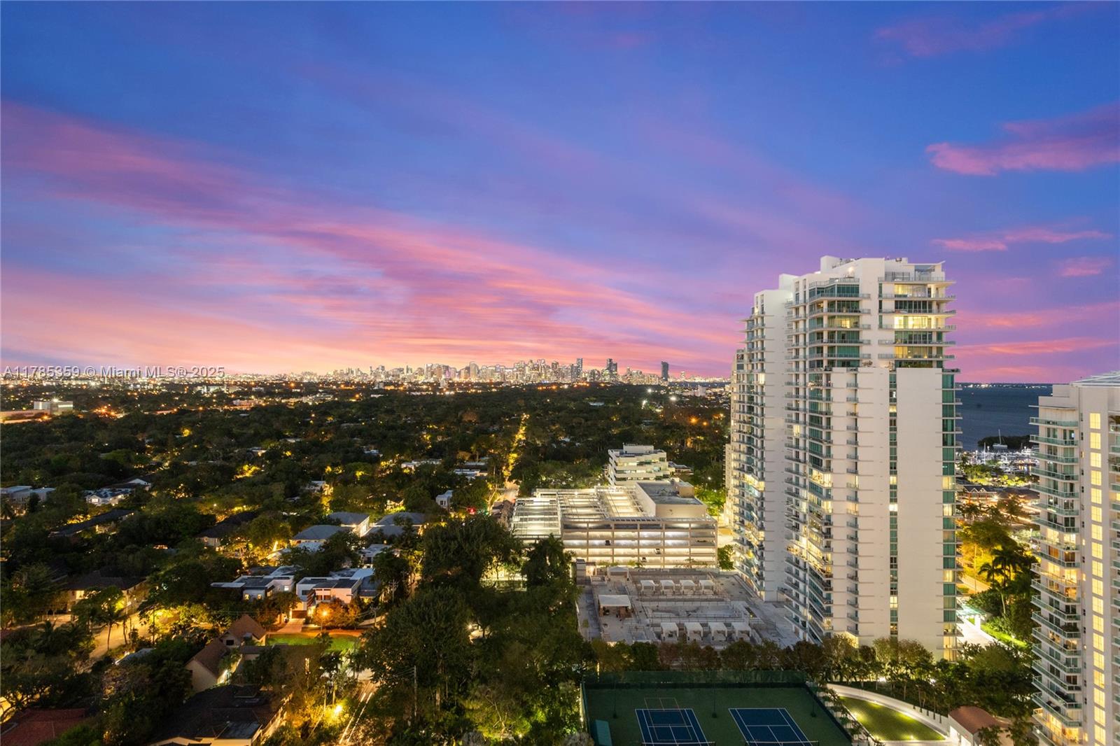 2678 Tigertail Avenue, Unit PH4 Miami, FL 33133 - Photo 56 of 75 a view of a city with tall buildings