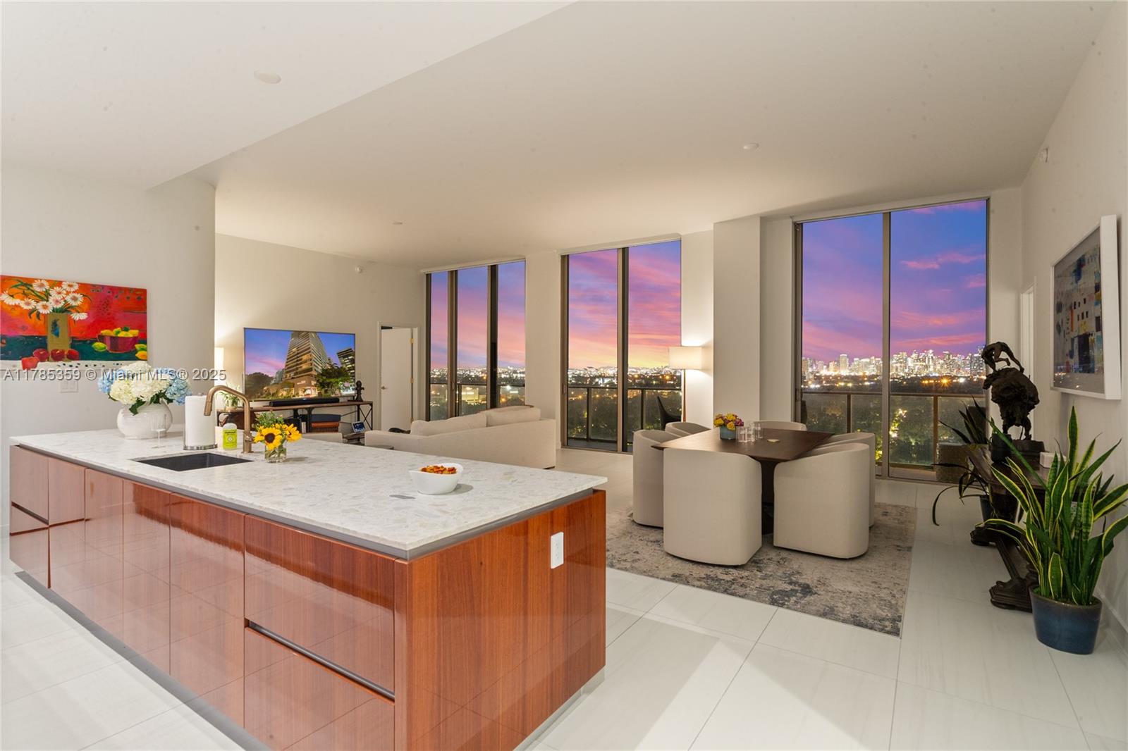 2678 Tigertail Avenue, Unit PH4 Miami, FL 33133 - Photo 59 of 75 a view of kitchen island with furniture and window