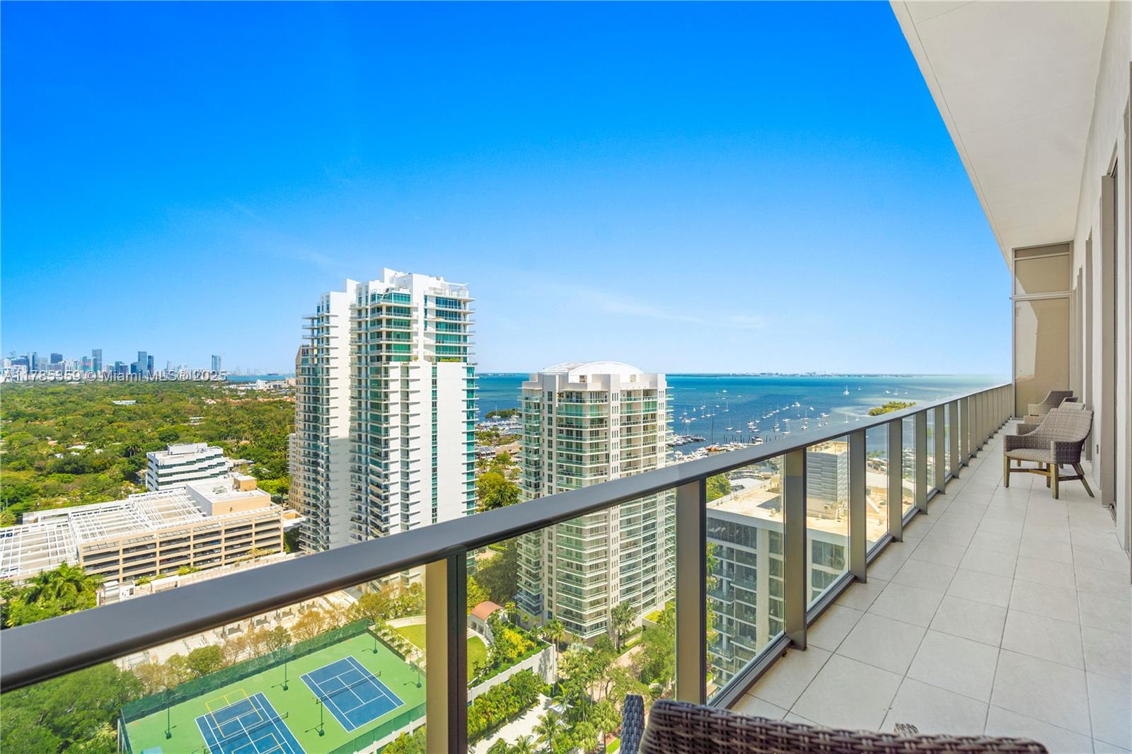 2678 Tigertail Avenue, Unit PH4 Miami, FL 33133 - Photo 6 of 75 a view of city from a balcony