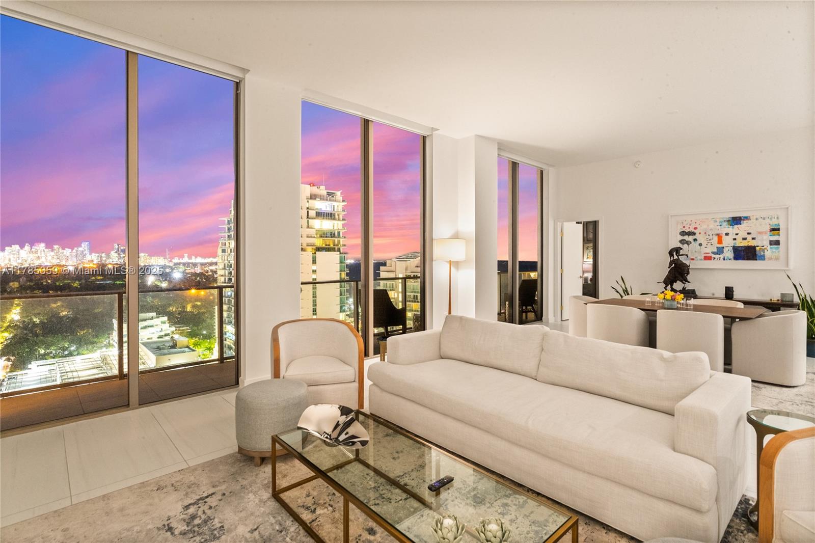 2678 Tigertail Avenue, Unit PH4 Miami, FL 33133 - Photo 71 of 75 a living room with furniture and a large window