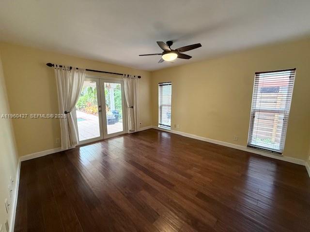 11600 Southwest 113th Place Miami, FL 33176 - Photo 11 of 21 a view of an empty room with wooden floor and a window