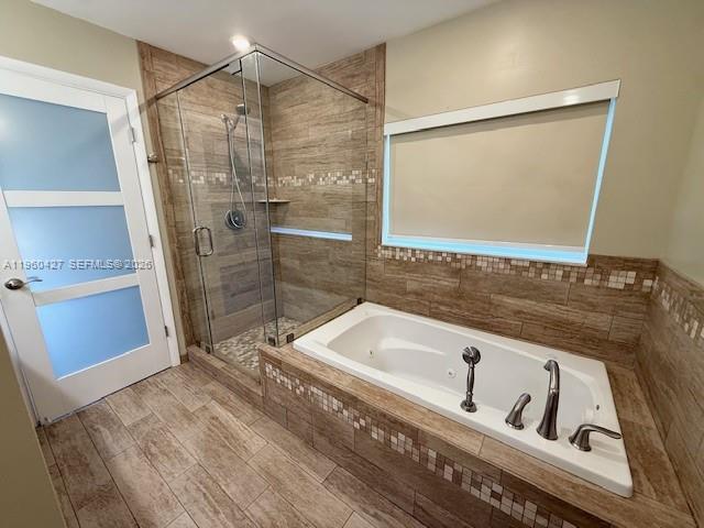11600 Southwest 113th Place Miami, FL 33176 - Photo 12 of 21 a bathroom with a tub a sink and a shower