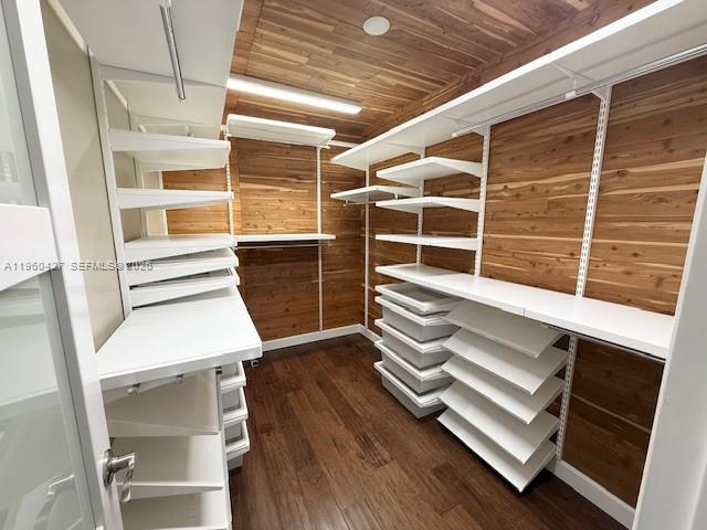 11600 Southwest 113th Place Miami, FL 33176 - Photo 16 of 21 a view of walk in closet with empty racks