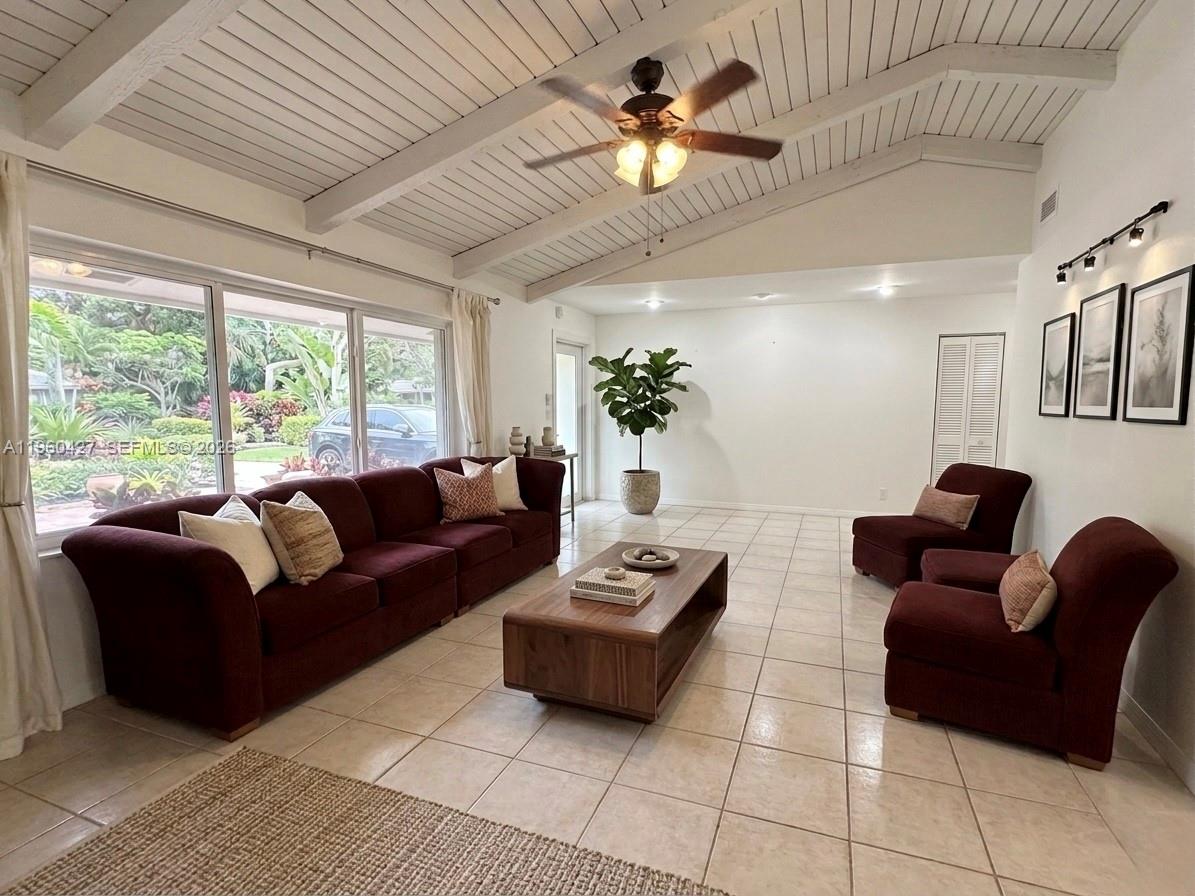 11600 Southwest 113th Place Miami, FL 33176 - Photo 3 of 21 a living room with furniture and a large window