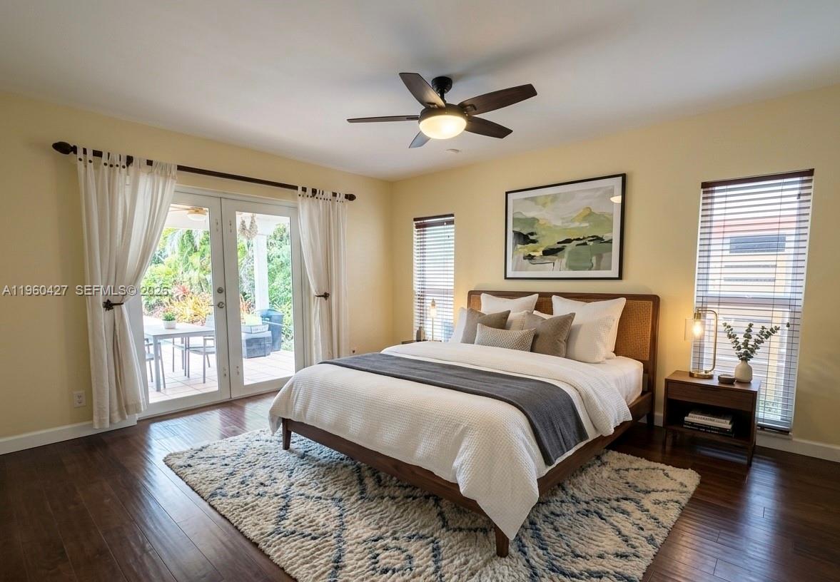 11600 Southwest 113th Place Miami, FL 33176 - Photo 5 of 21 a bedroom with a large bed and a window