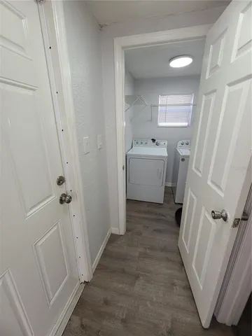 a bathroom with sink a toilet and shower