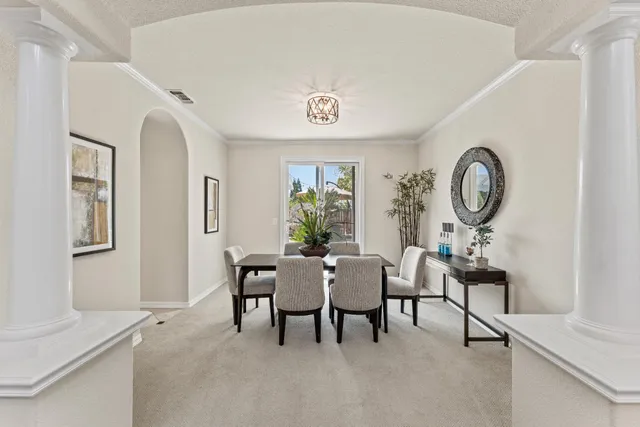 a view of a livingroom with furniture and window