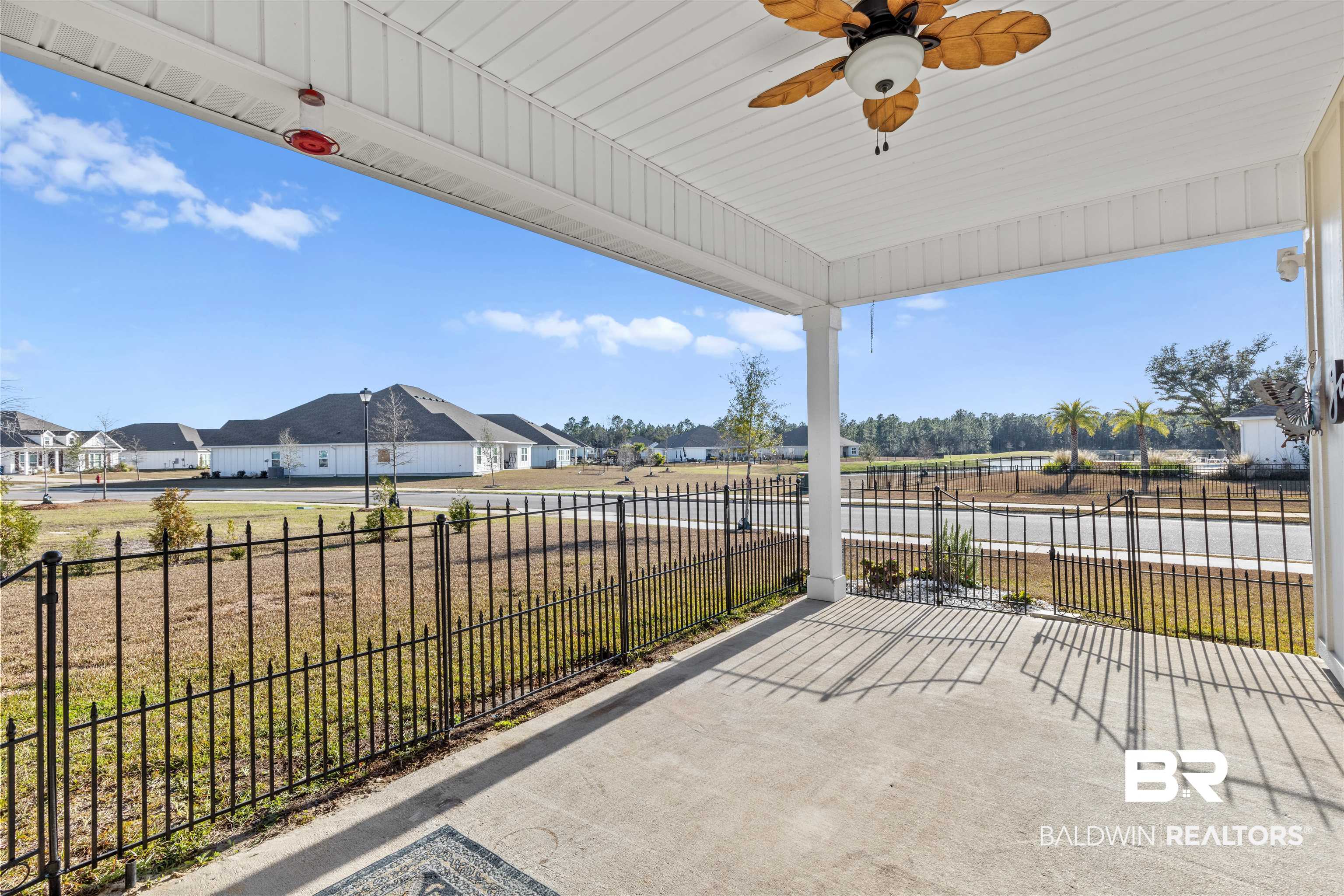 485 Shepard Street Gulf Shores, AL 36542 - Photo 44 of 53 View of patio featuring a residential view and a ceiling fan
