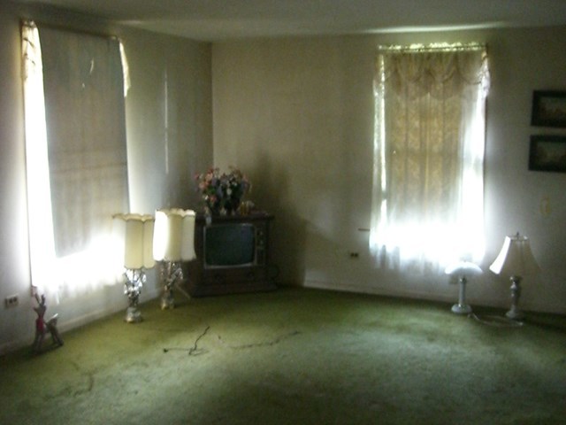 3346 Millerfield Road Macon, GA 31211 - Photo 3 of 6 a room with a window and a fireplace