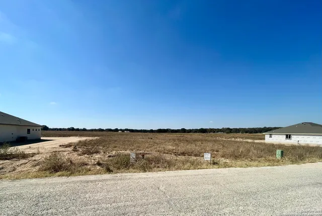 a view of lake with sunset