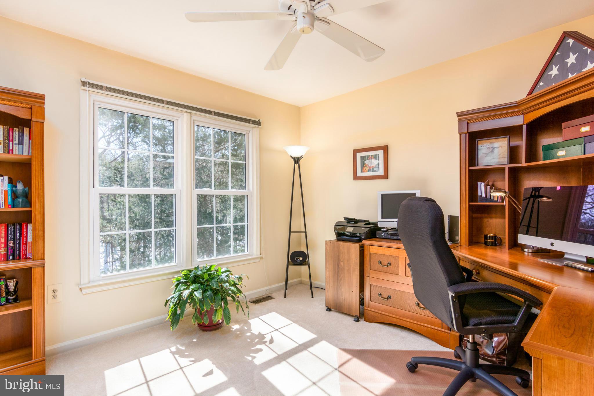 3130 Stonehenge Drive Riva, MD 21140 - Photo 19 of 30 a view of a workspace with furniture and a window
