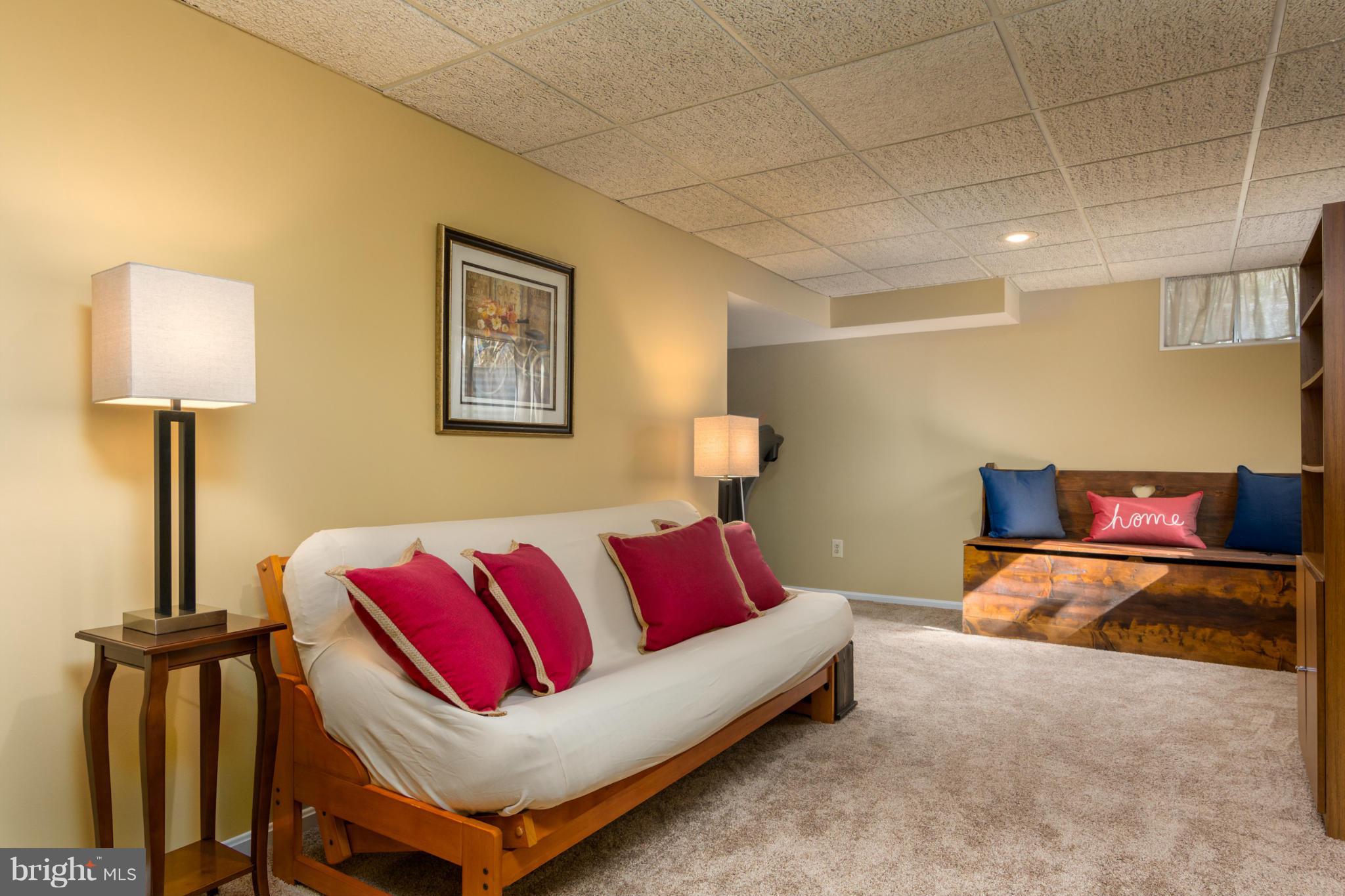 3130 Stonehenge Drive Riva, MD 21140 - Photo 27 of 30 a living room with furniture and a lamp
