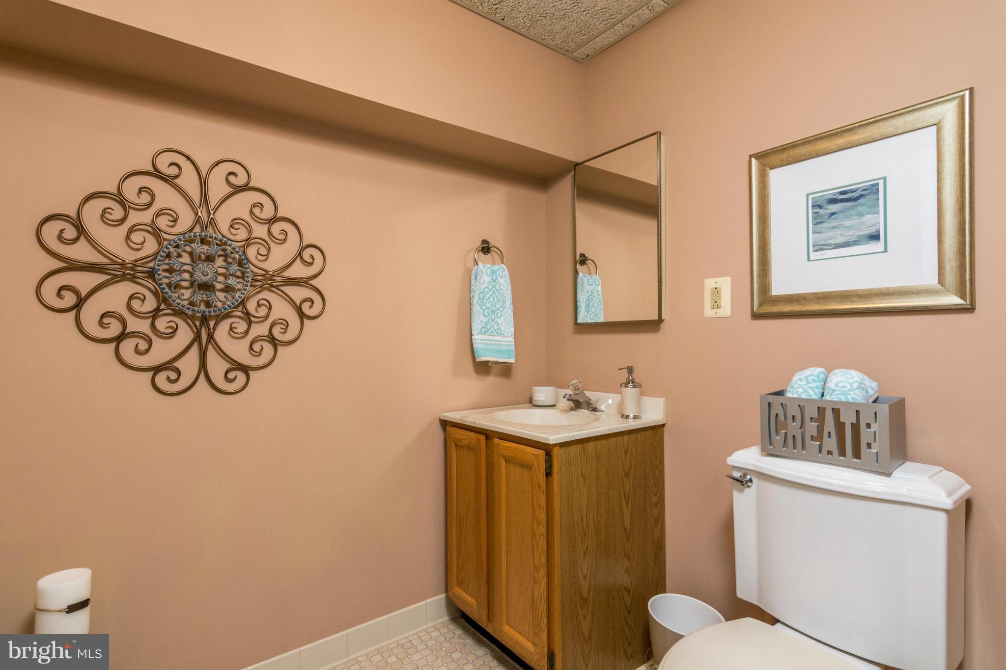 3130 Stonehenge Drive Riva, MD 21140 - Photo 28 of 30 a bathroom with a toilet and a sink