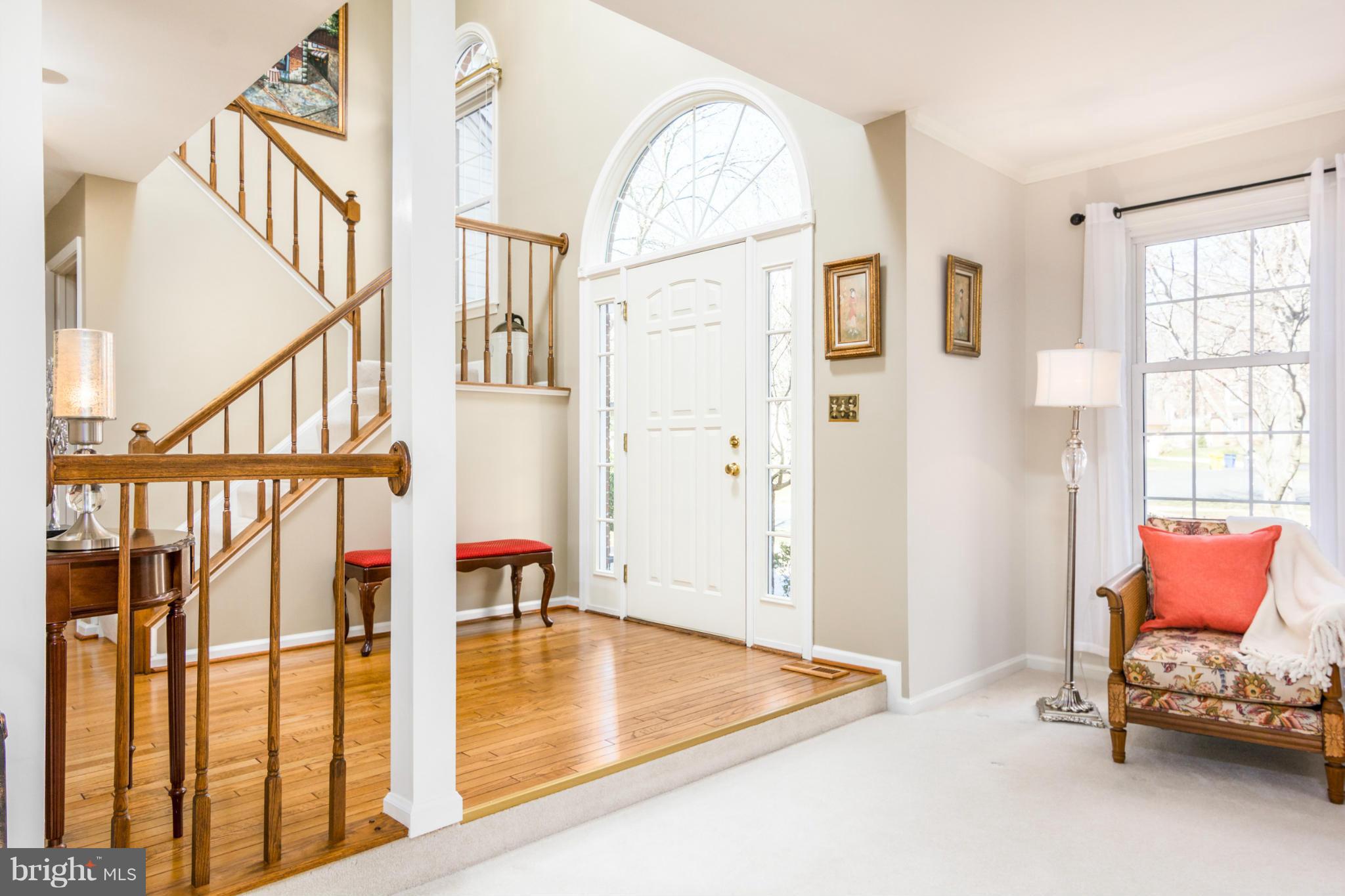 3130 Stonehenge Drive Riva, MD 21140 - Photo 4 of 30 a view of an entryway with wooden floor and door