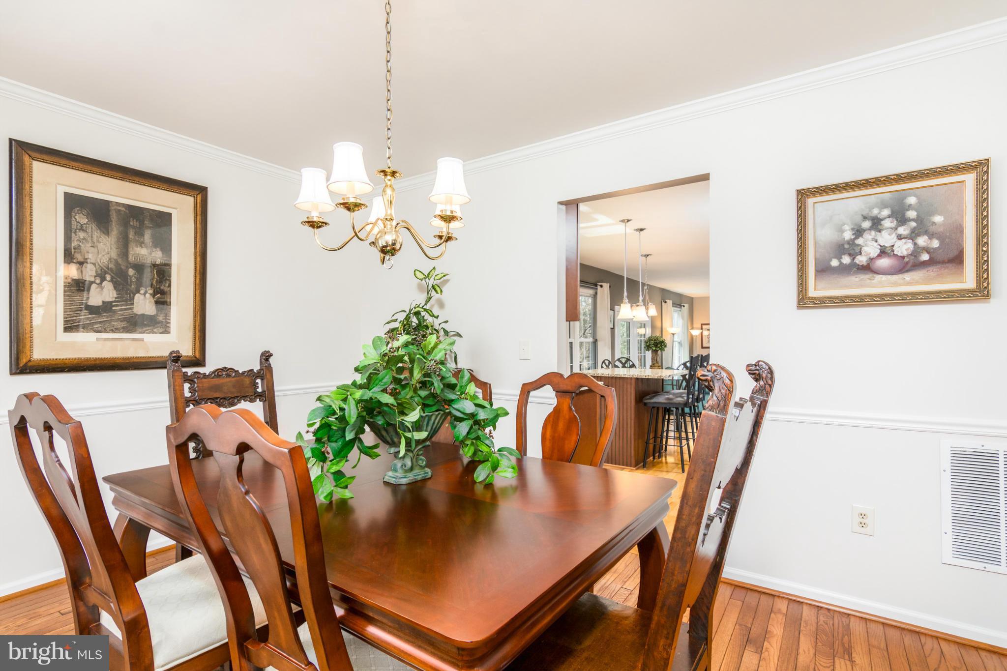 3130 Stonehenge Drive Riva, MD 21140 - Photo 8 of 30 a view of a dining room with furniture and chandelier