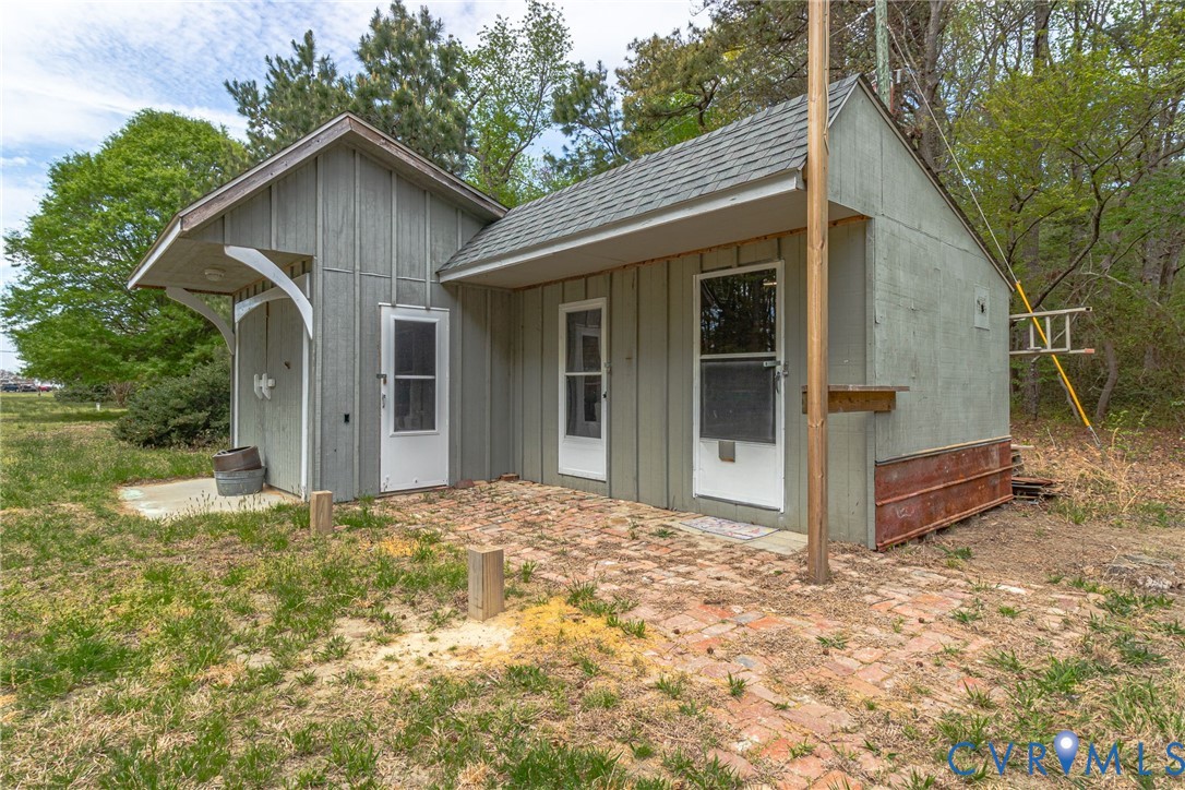 193 Deep Water Lane Reedville, VA 22539 - Photo 67 of 84 a view of a house with a yard