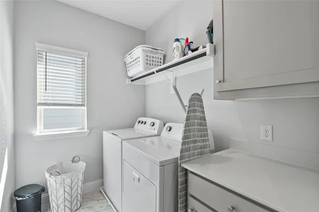 a bathroom with a sink toilet tub and shower