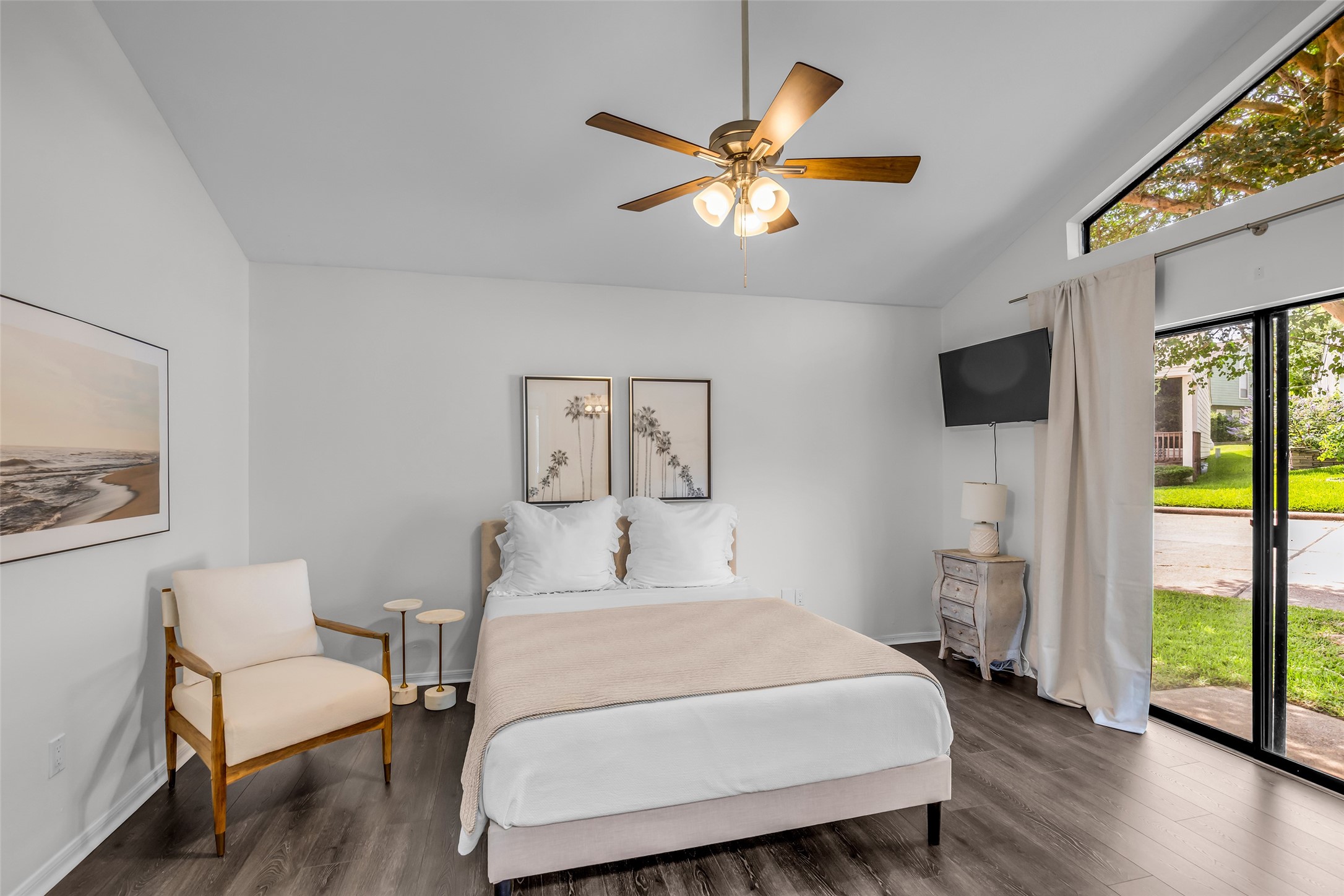 62 April Point Drive North Conroe, TX 77356 - Photo 19 of 25 a bedroom with a bed and wooden floor