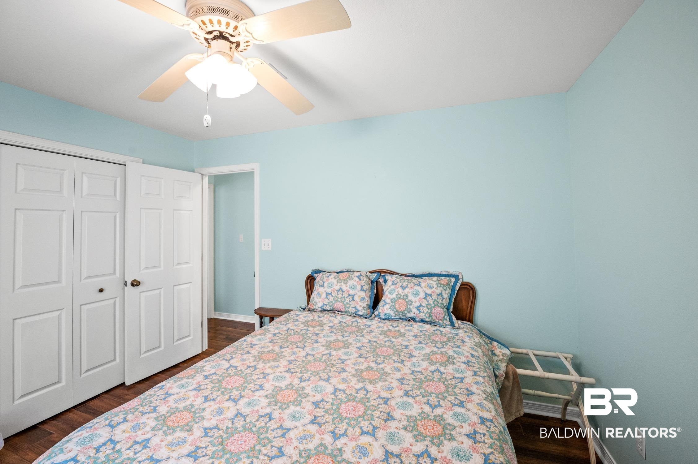 2553 Santa Rosa Drive Lillian, AL 36549 - Photo 31 of 51 Bedroom with dark wood-style floors, a closet, baseboards, and a ceiling fan
