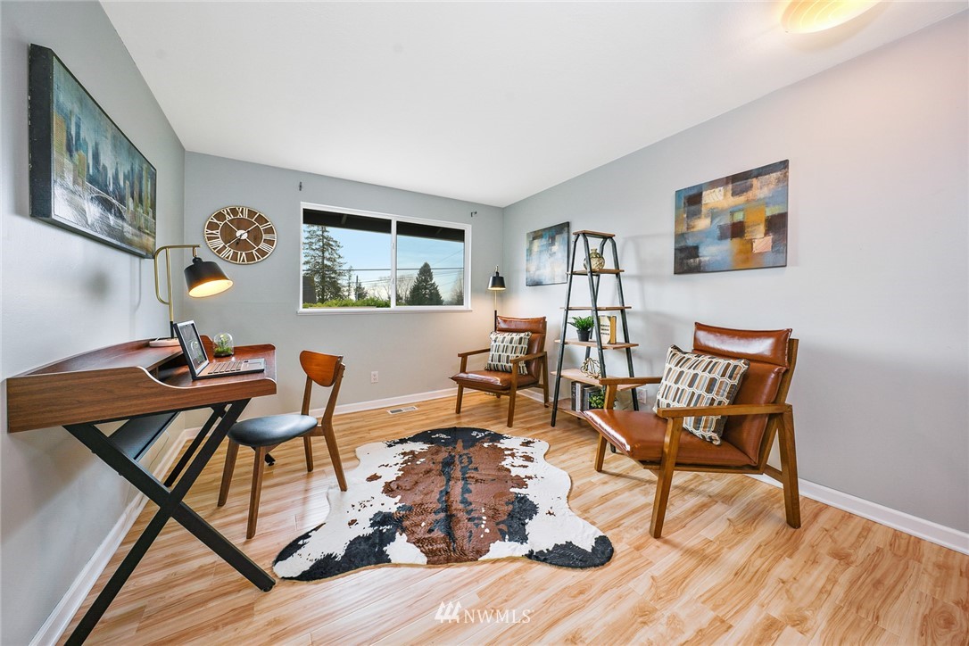 820 Southwest 3rd Place Renton, WA 98057 - Photo 10 of 18 a living room with furniture and wooden floor