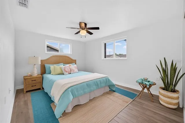 a bathroom with a toilet sink and shower