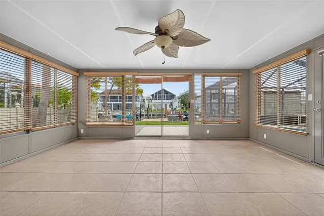 a view of a patio with a table and chairs