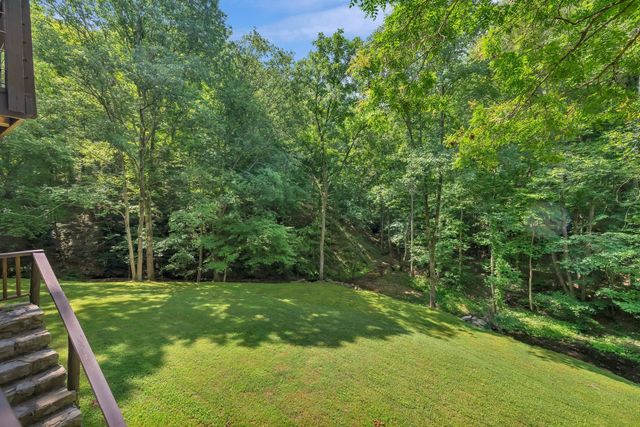 view of a house with a yard
