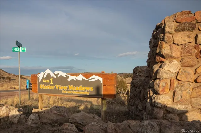 a view of swimming pool from a balcony