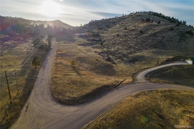 a view of a backyard of a house