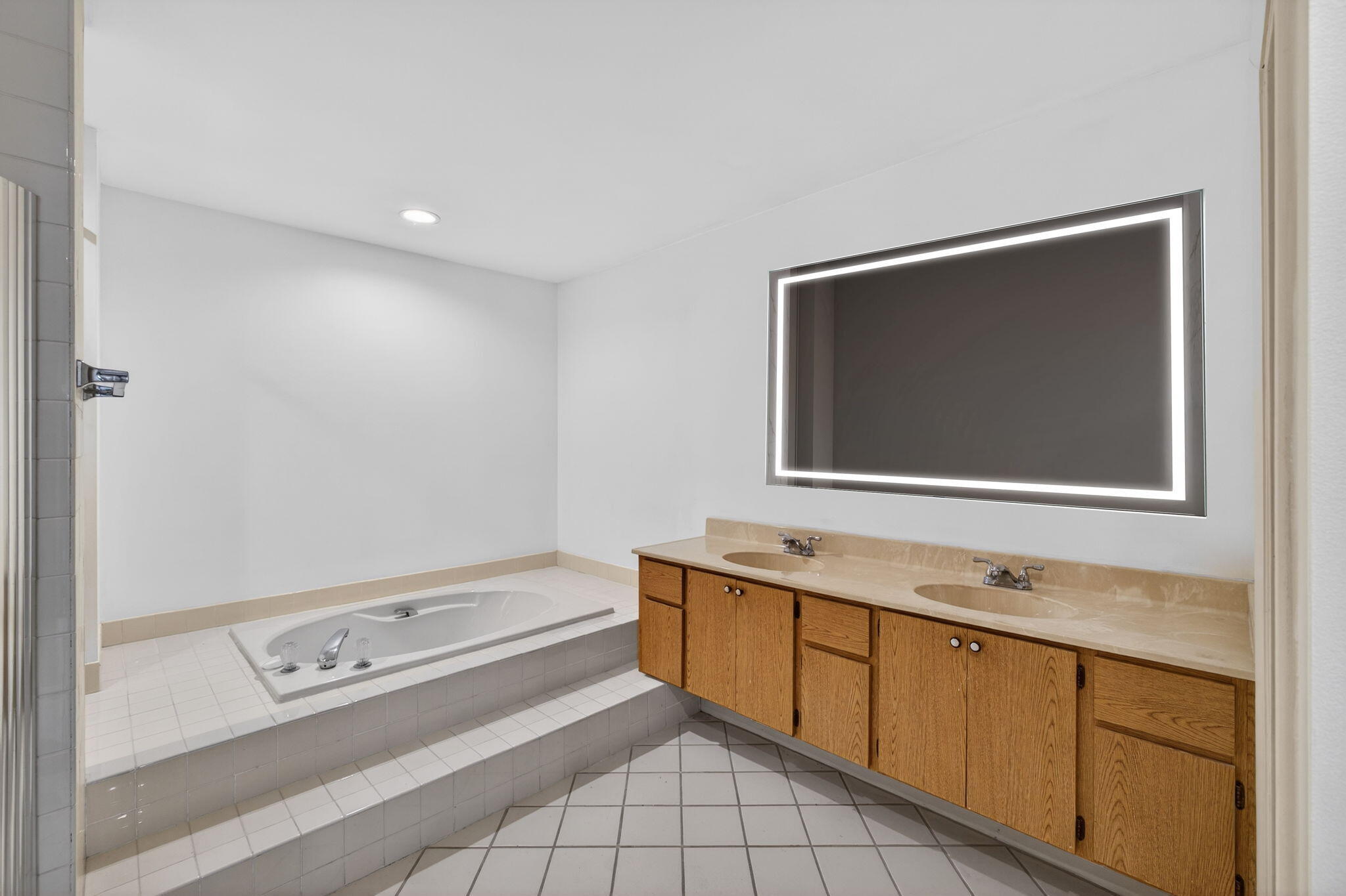 239 Ridge Road Jupiter, FL 33477 - Photo 36 of 75 a bathroom with a sink and a mirror