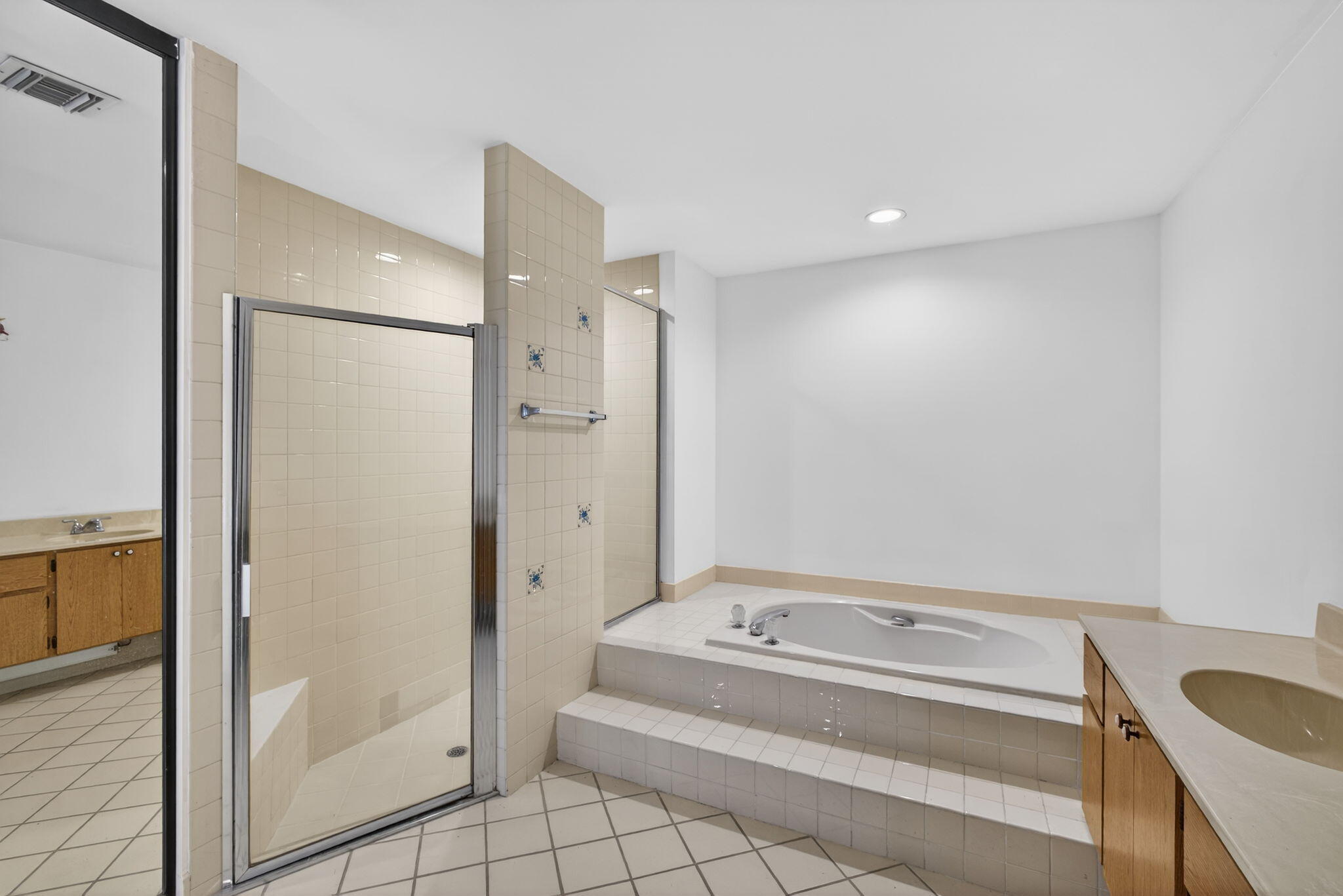 239 Ridge Road Jupiter, FL 33477 - Photo 37 of 75 a bathroom with a tub and a shower