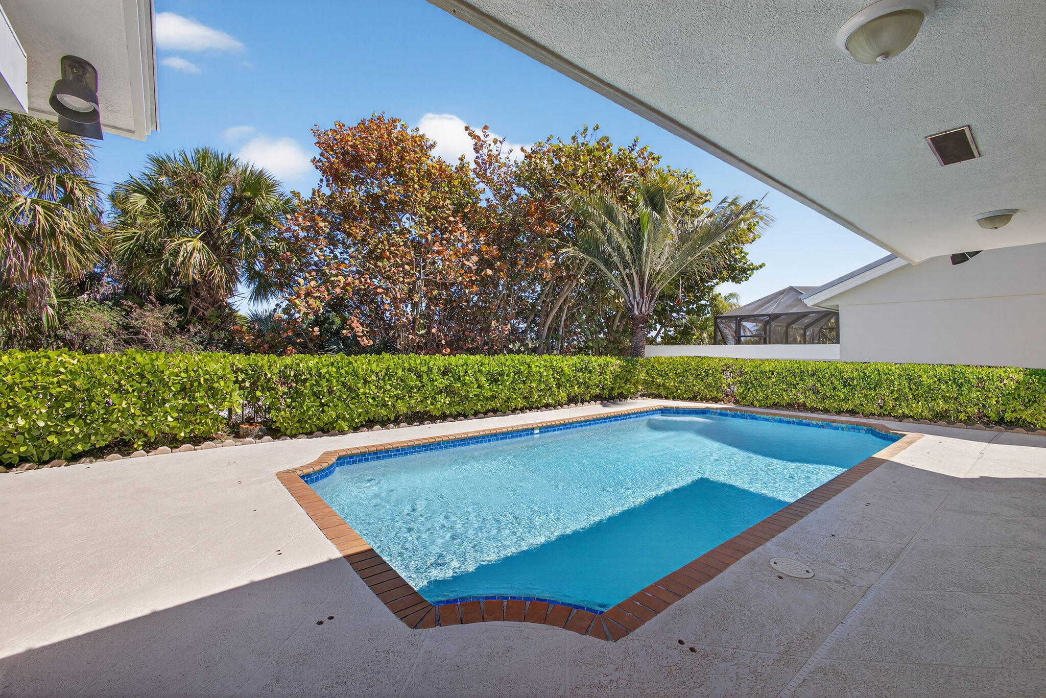 239 Ridge Road Jupiter, FL 33477 - Photo 53 of 75 a view of outdoor space with swimming pool