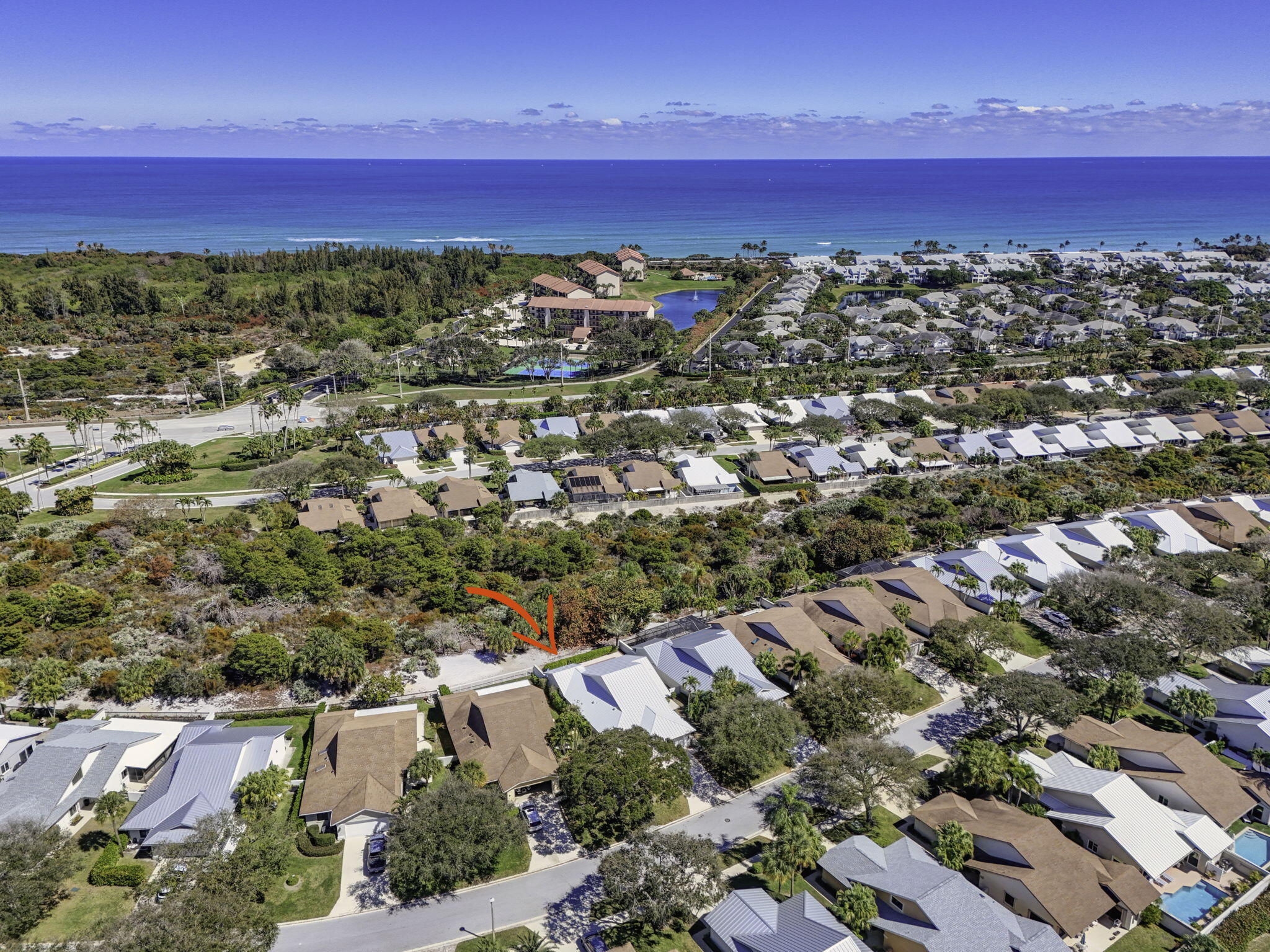 239 Ridge Road Jupiter, FL 33477 - Photo 65 of 75 an aerial view of a city with lots of residential buildings