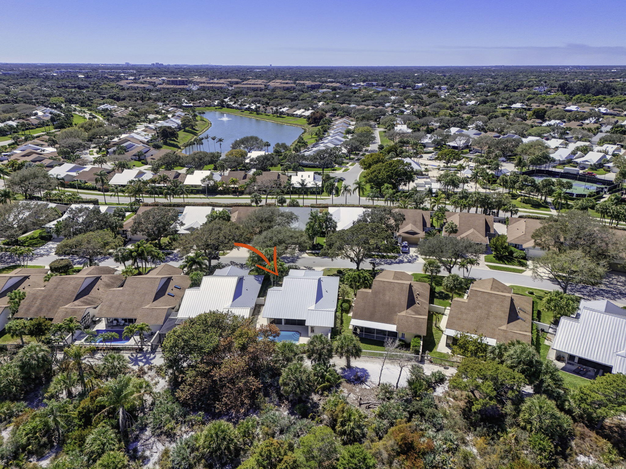 239 Ridge Road Jupiter, FL 33477 - Photo 72 of 75 an aerial view of a city with lots of residential buildings