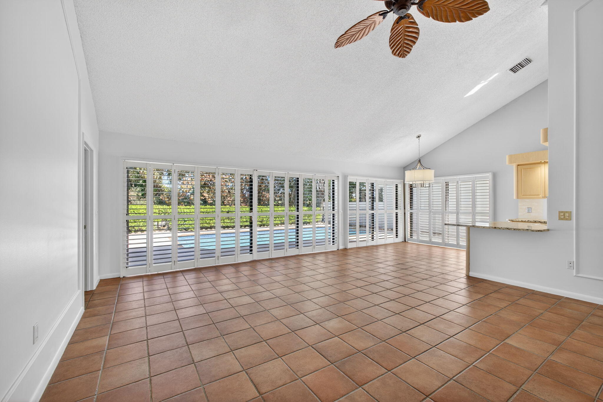 239 Ridge Road Jupiter, FL 33477 - Photo 10 of 75 a view of an empty room with a window