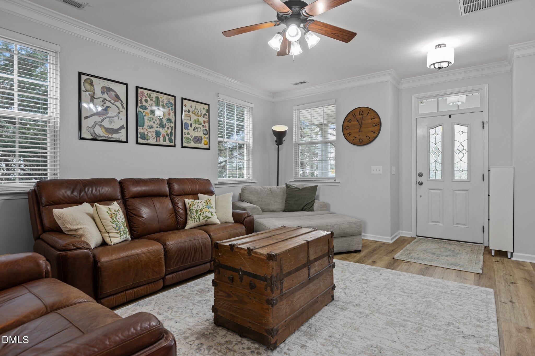 1104 Pebblestone Drive Durham, NC 27703 - Photo 7 of 28 a living room with furniture and a window