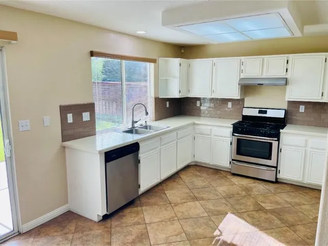 a view of a livingroom with a staircase